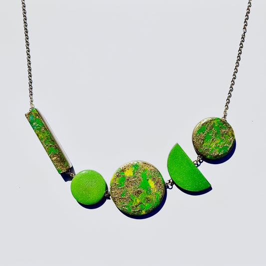 Twist ‘N’ Go Green Gold Hand-Painted Transforming Wooden Necklace – Multi-Shape Statement Piece