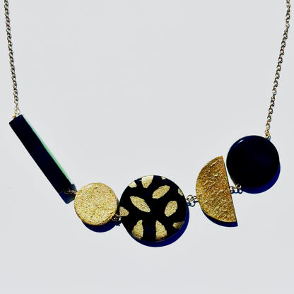 Twist ‘N’ Go Green Gold Hand-Painted Transforming Wooden Necklace – Multi-Shape Statement Piece