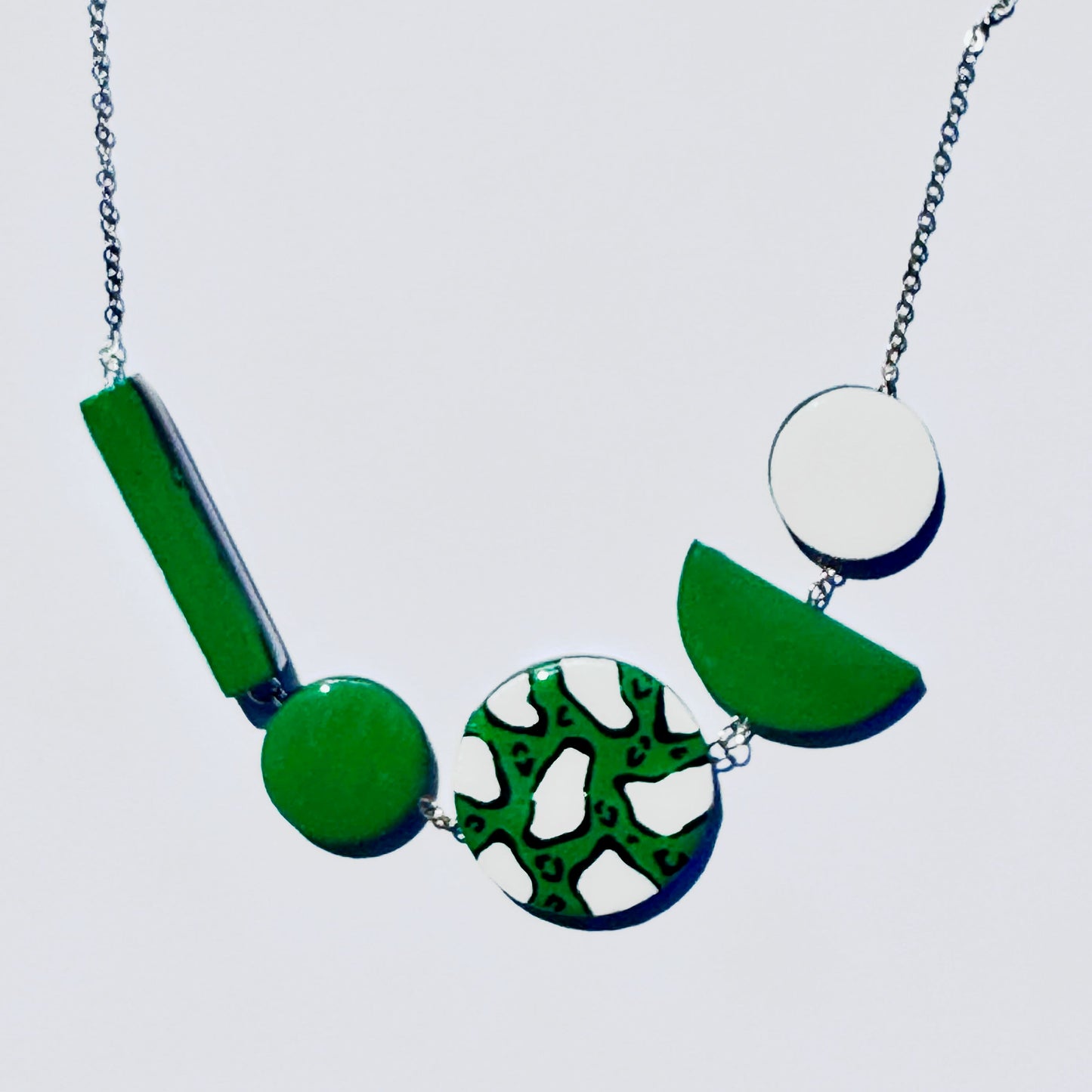 Twist ‘N’ Go Green White Hand-Painted Transforming Wooden Necklace – Multi-Shape Statement Piece