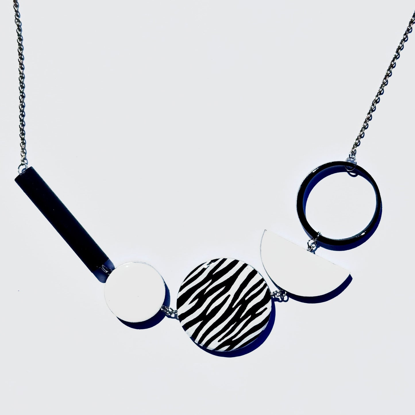 Twist ‘N’ Go Black White Hand-Painted Transforming Wooden Necklace – Multi-Shape Statement Piece