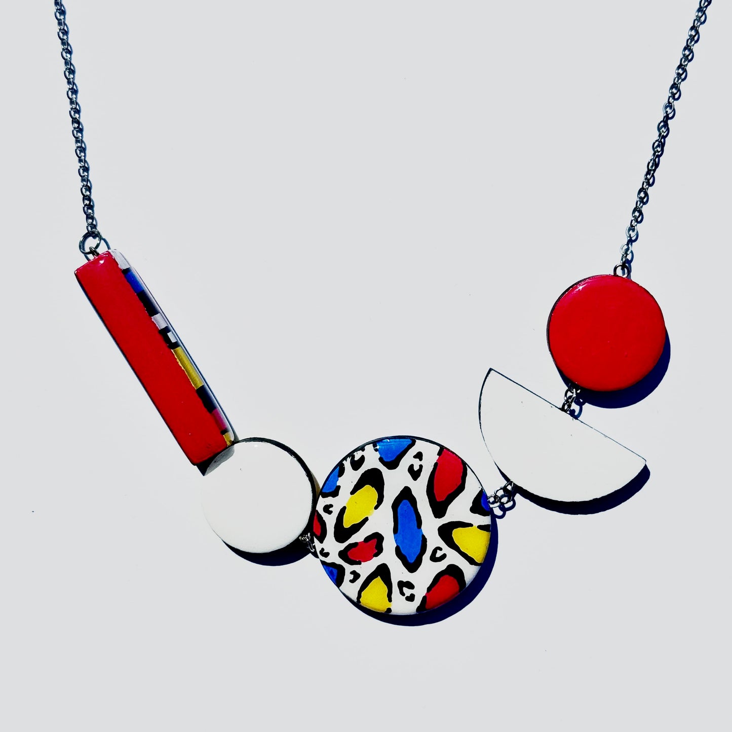Twist ‘N’ Go Mondrian Hand-Painted Transforming Wooden Necklace – Multi-Shape Statement Piece