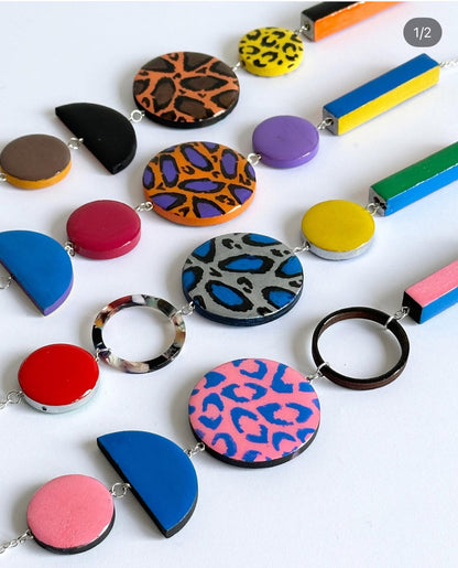 Twist 'N' Go Hand-Painted Transforming Wooden Necklace – Multi-Shape Colourful Statement Piece