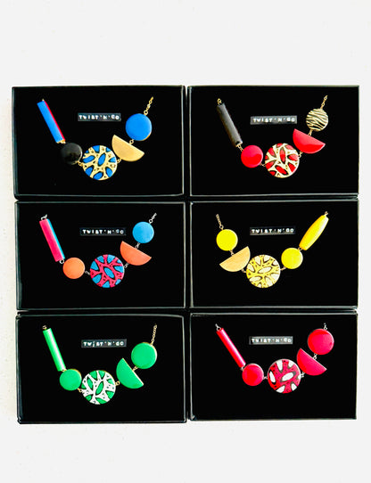 Twist 'N' Go Hand-Painted Transforming Wooden Necklace – Multi-Shape Colourful Statement Piece